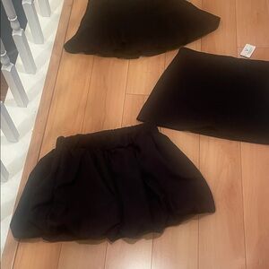 Elegant Black first 2, skorts. 3rd bubble skirt. All are new. Never worn.